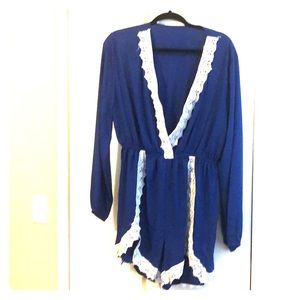 Long sleeved sheer crochet short jumpsuit